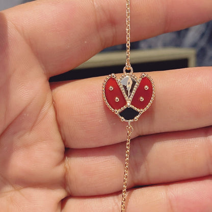 [GALE] Armband mit Glücksfedermotiv 1, rosa-golden